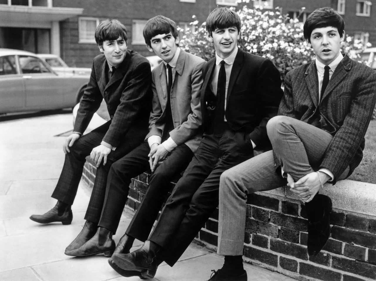 Os quatro integrantes dos Beatles